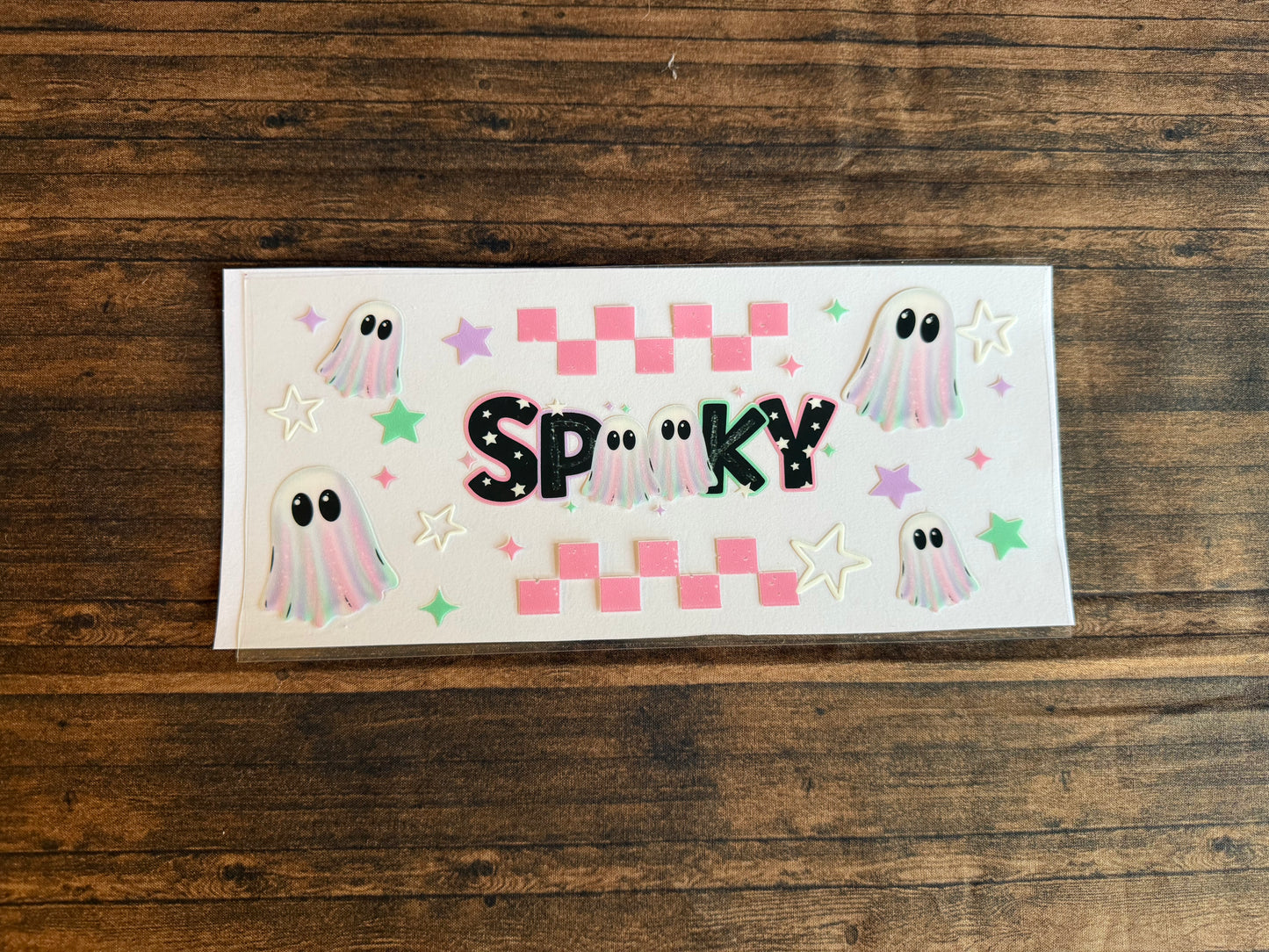 Holographic Spooky Ghost