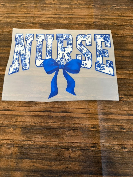 Blue Floral Nurse With Bow